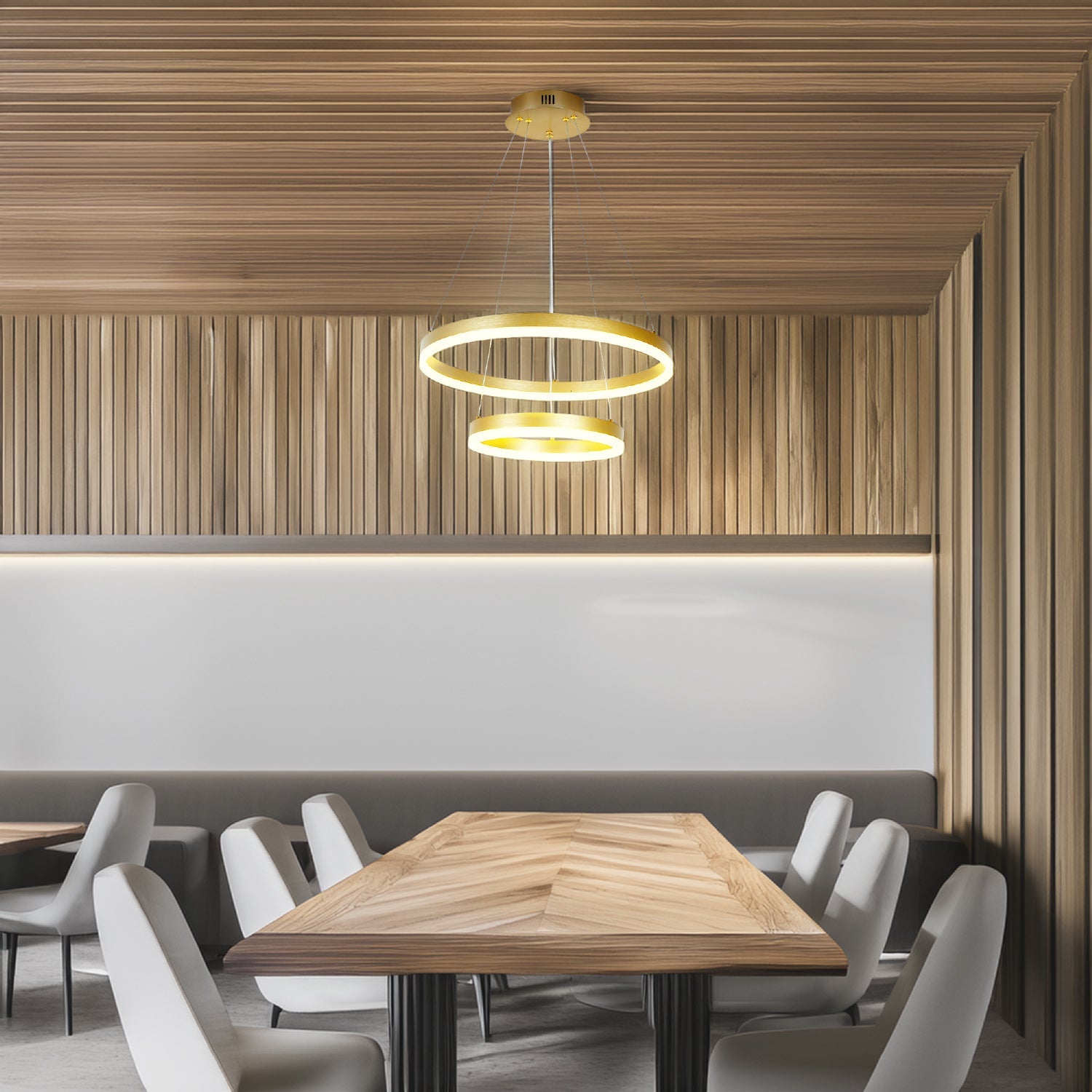 Lámpara led de aros iluminando mesa de restaurante